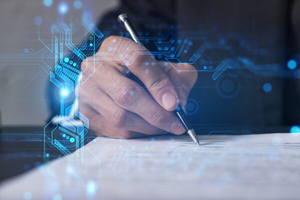 Feature image Man writing with pen