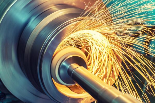 Feature image Flying sparks during manufacturing process. (Image source: AdobeStock.)