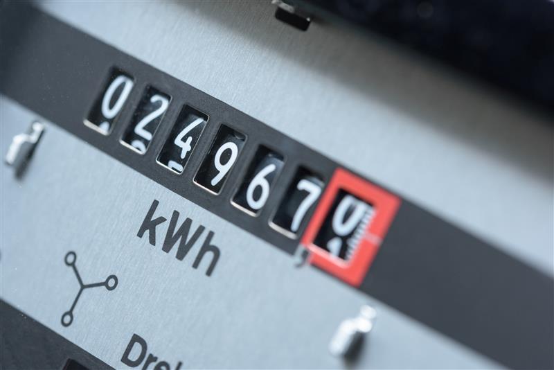 Electricity meter dials moving (Source: Adobe Stock)
