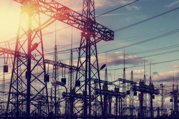 Feature image A close up of electricity pylons.