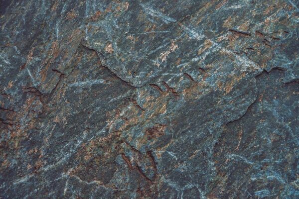 Closeup of grey stone. (Source: AdobeStock)